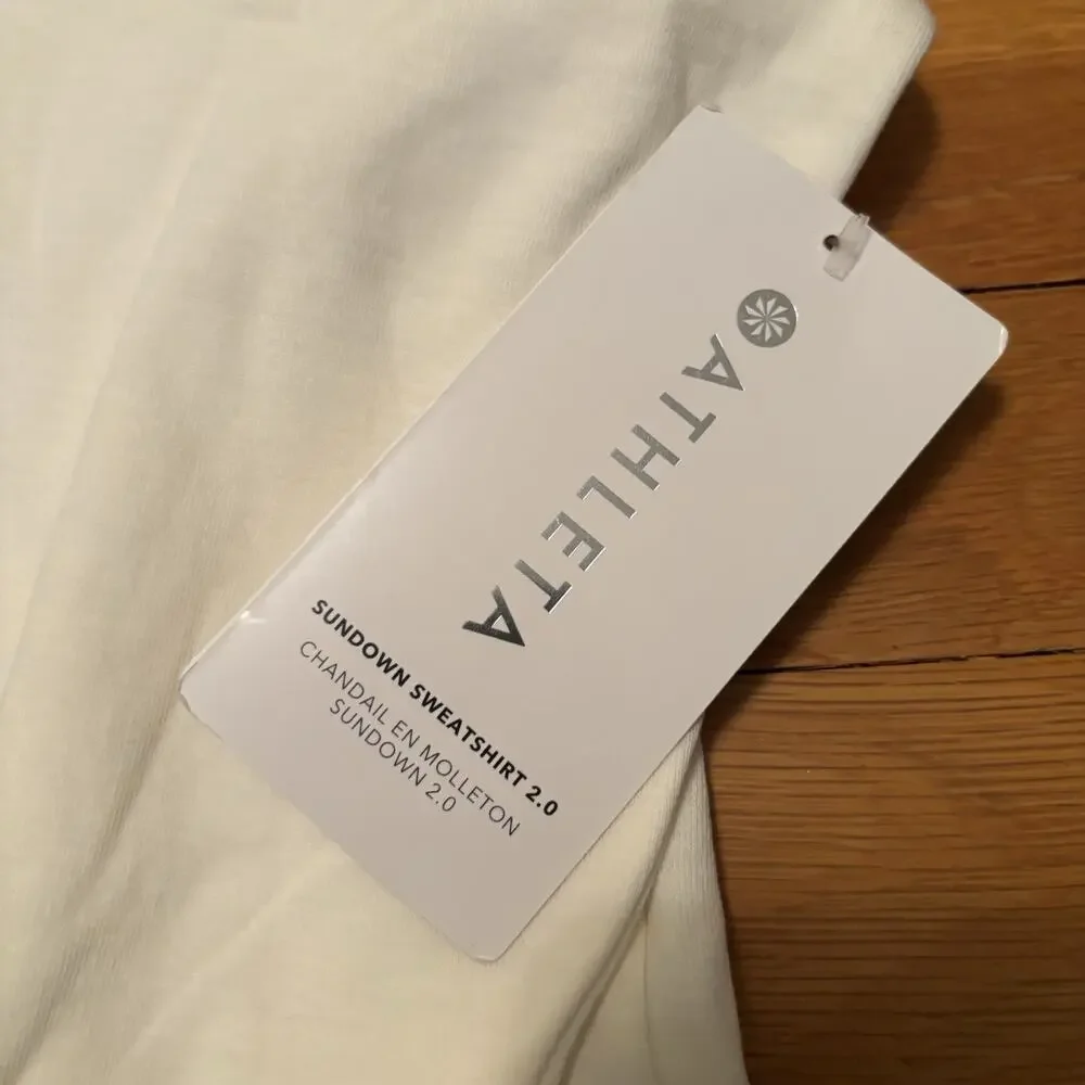 NWT ATHLETA Women’s Sundown Sweatshirt 2.0 White XS Stain New Workout Top